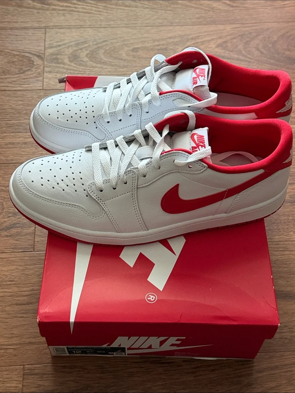 Brand New: Air Jordan 1 Low OG White and Red Sneakers.